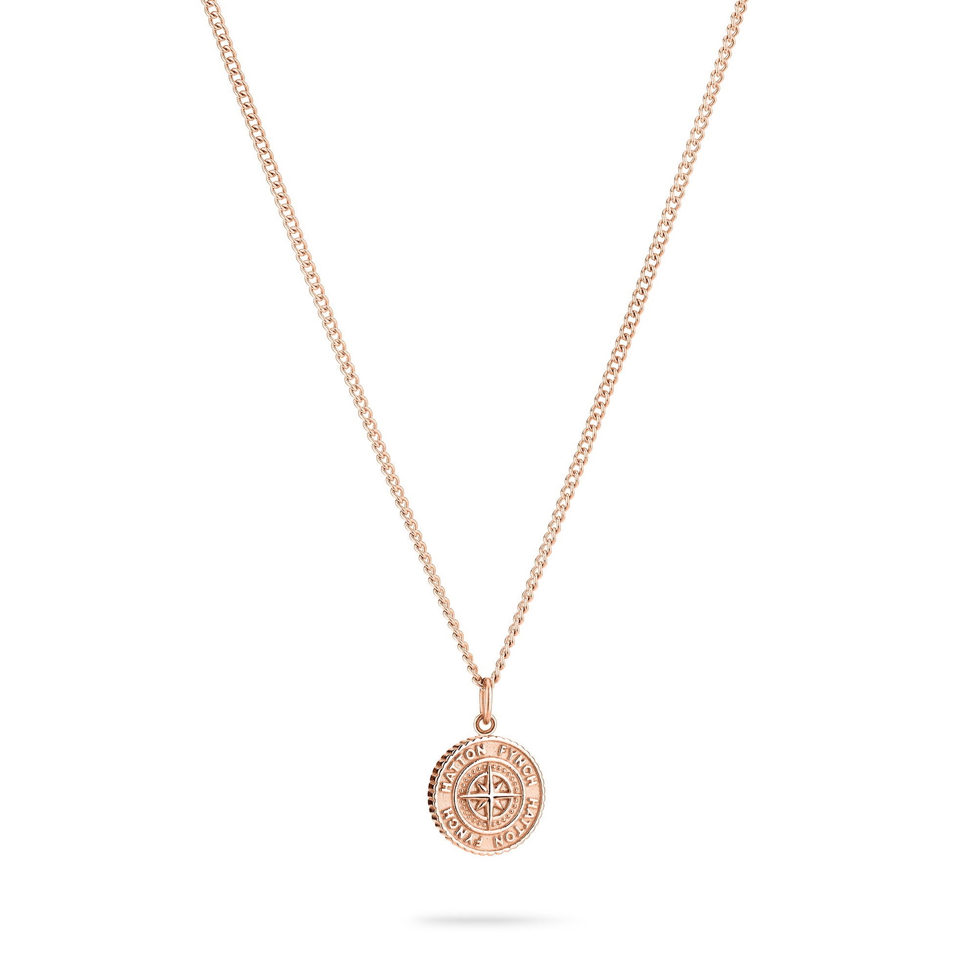Fynch-Hatton Halskette bestehend aus einer feinen, roségoldenen Kette mit Münz-Anhänger mit Nordstern-Design; Produktbild