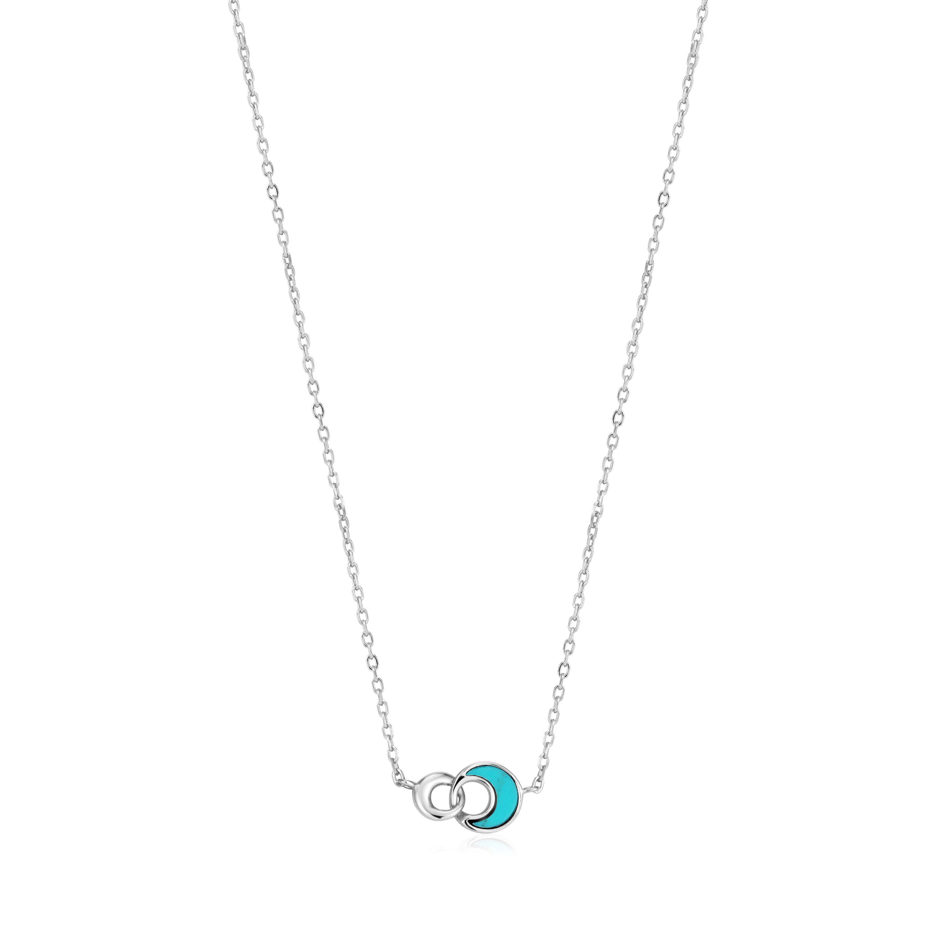 Die Ania Haie Halskette - Türkis Hidden Gem besteht aus zwei ineinander greifenden Ringen - einem aus massivem 925er Sterlingsilber und einem mit einem türkisfarbenen Halbkreis als Akzent.