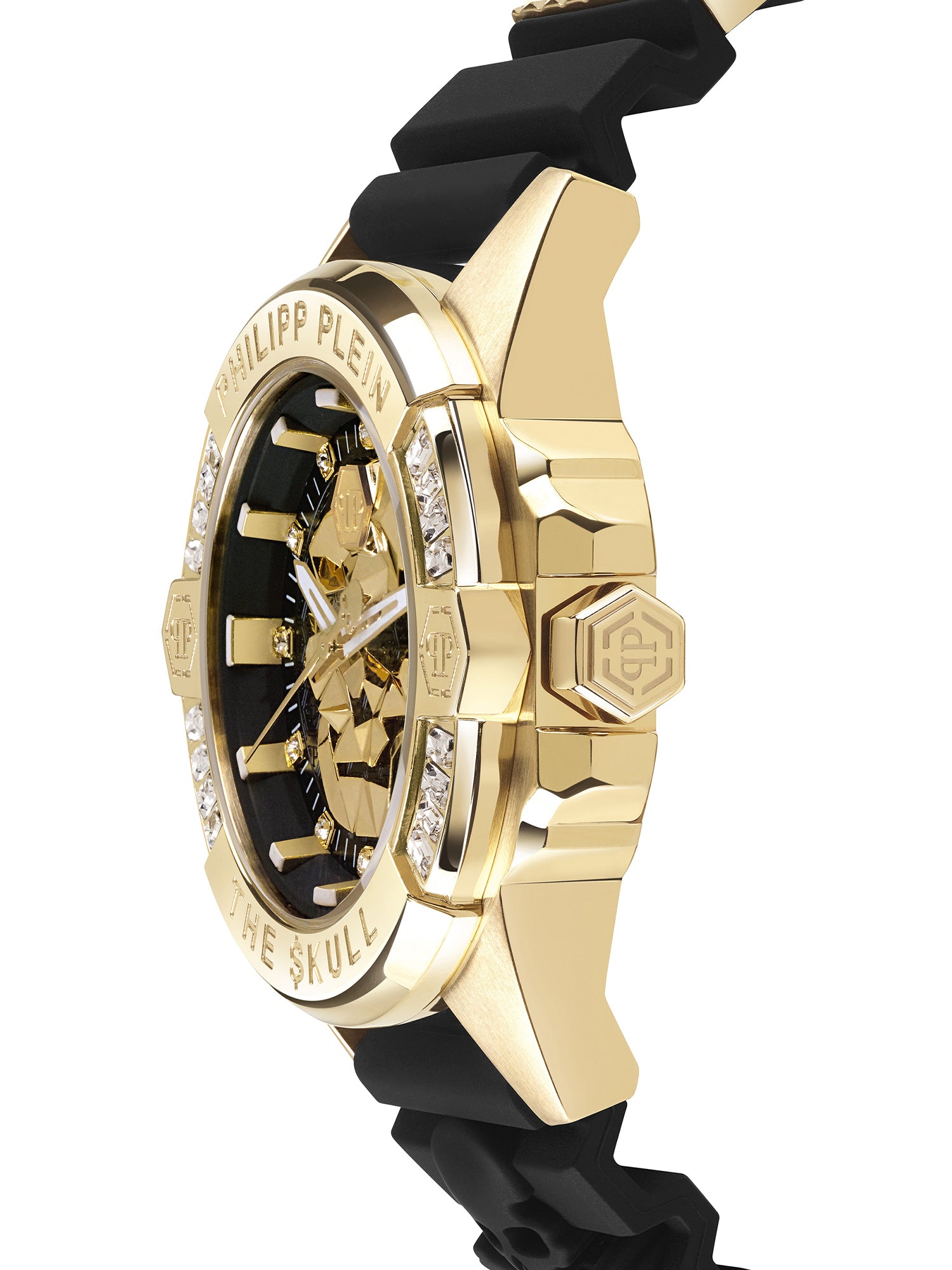 Die Philipp Plein Armbanduhr - The Skull Genderless von Philipp Plein besticht durch Edelstein-Akzente, ein schwarzes Band und ein Totenkopf-Zifferblatt mit facettiertem 3D-Design für einen auffälligen Look, der aus jedem Blickwinkel besticht.
