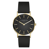 Liebeskind Berlin Armbanduhr mit schwarzem Zifferblatt, goldenen Indizes, goldenem Gehäuse und schwarzem Lederband; Produktbild