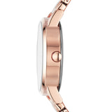 Seitenansicht der DKNY Armbanduhr - The Basic Must-Have Minimalist in elegantem Roségold, das die Krone und einen Teil des Edelstahlarmbandes hervorhebt.