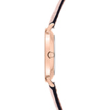 Seitenansicht der Tamaris Armbanduhr - The Woven by Tamaris in Roségold, mit schlankem Gehäuse und zweifarbigem Lederband für zeitlose Eleganz.
