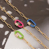 Ania Haie Armbänder aus goldenen Gliedern und verschieden lackierten Anhängern mit Glitzersteinen Produktbild