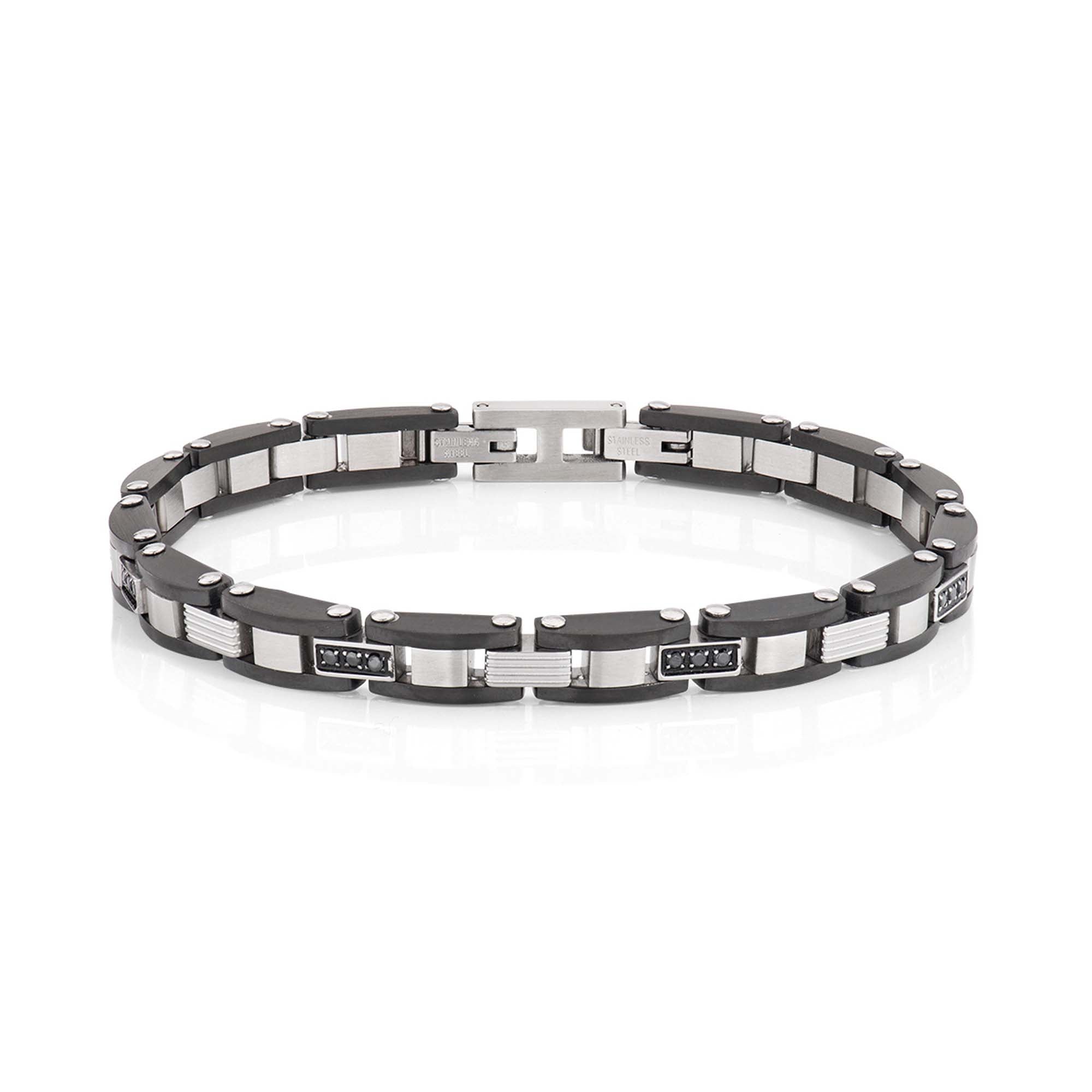 Das Amen Armband - The Classic von Amen zeichnet sich durch schlichte schwarze und silberne rechteckige Segmente aus, die aus Edelstahl gefertigt sind und auf einem weißen Hintergrund erscheinen.