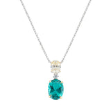 Die Amen Halskette - The Green Pendant von Amen besteht aus 925er Sterlingsilber und besitzt einen gelben Diamanten sowie einen ovalen, tealfarbenen Edelstein als Anhänger an einer feinen Kette.