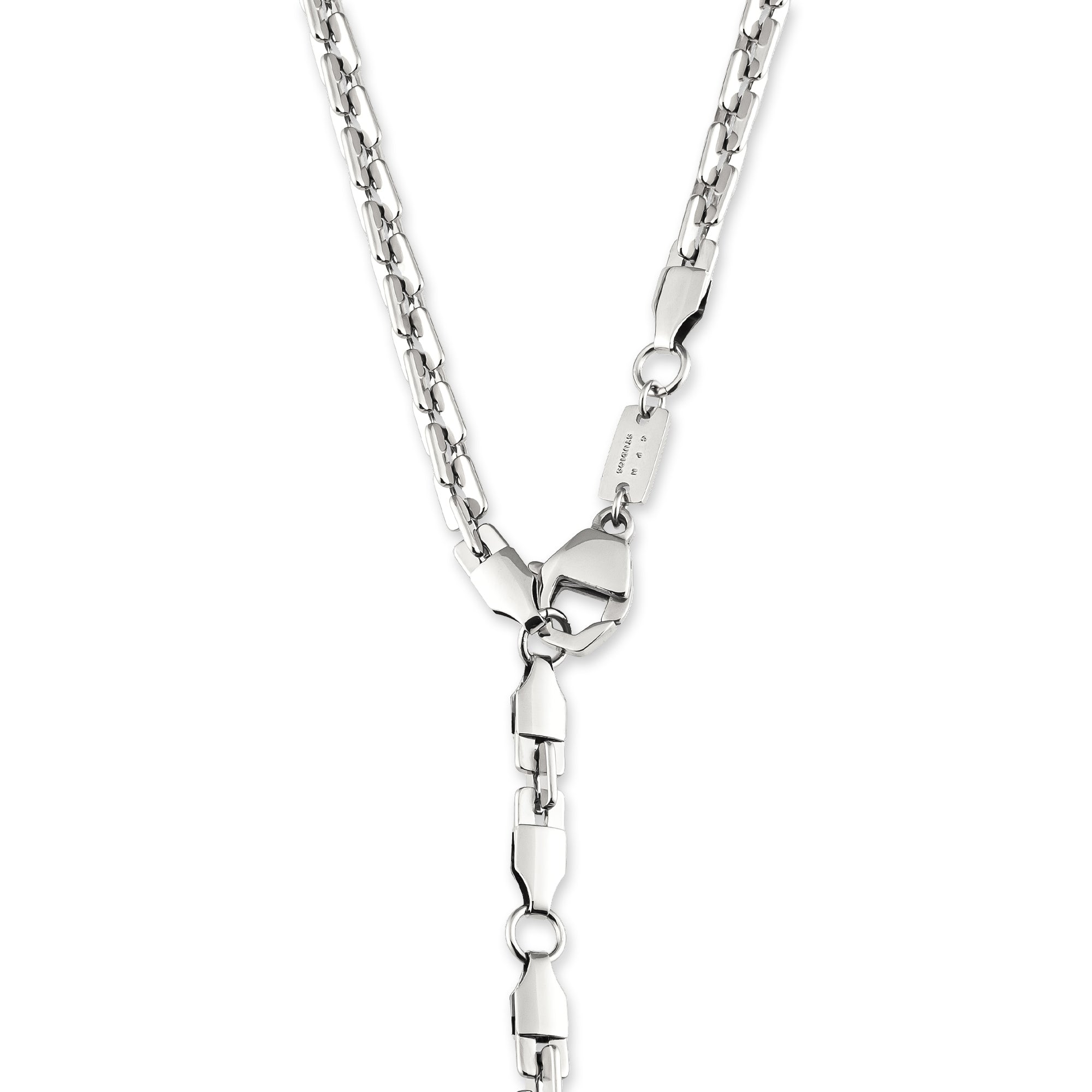 Die COPENHAGEN STUDIOS Halskette - Edgy Necklace von Copenhagen Studios besticht durch ihre urbane Ästhetik mit einem einzigartigen geometrischen Gliederdesign und einem markanten, herabfallenden Mittelteil.