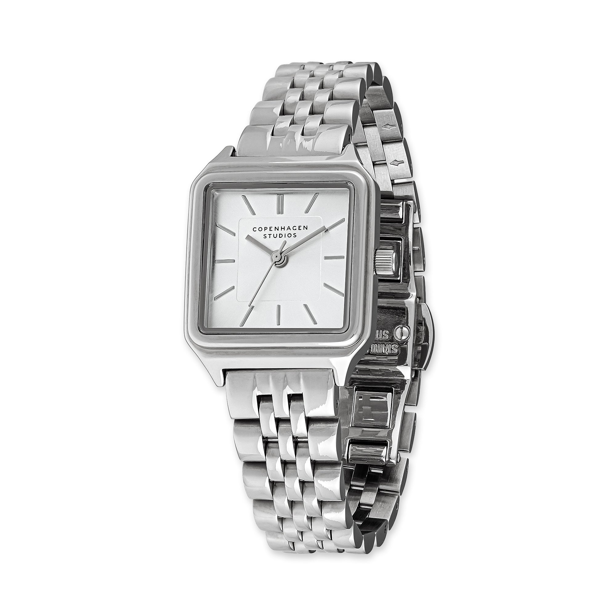 Die COPENHAGEN STUDIOS Armbanduhr - Vintage Watch von Copenhagen Studios zeichnet sich durch ein quadratisches silbernes Gehäuse, ein minimalistisches weißes Zifferblatt und ein elegantes Metallgliederband aus - perfekt für einen dezenten Stil.