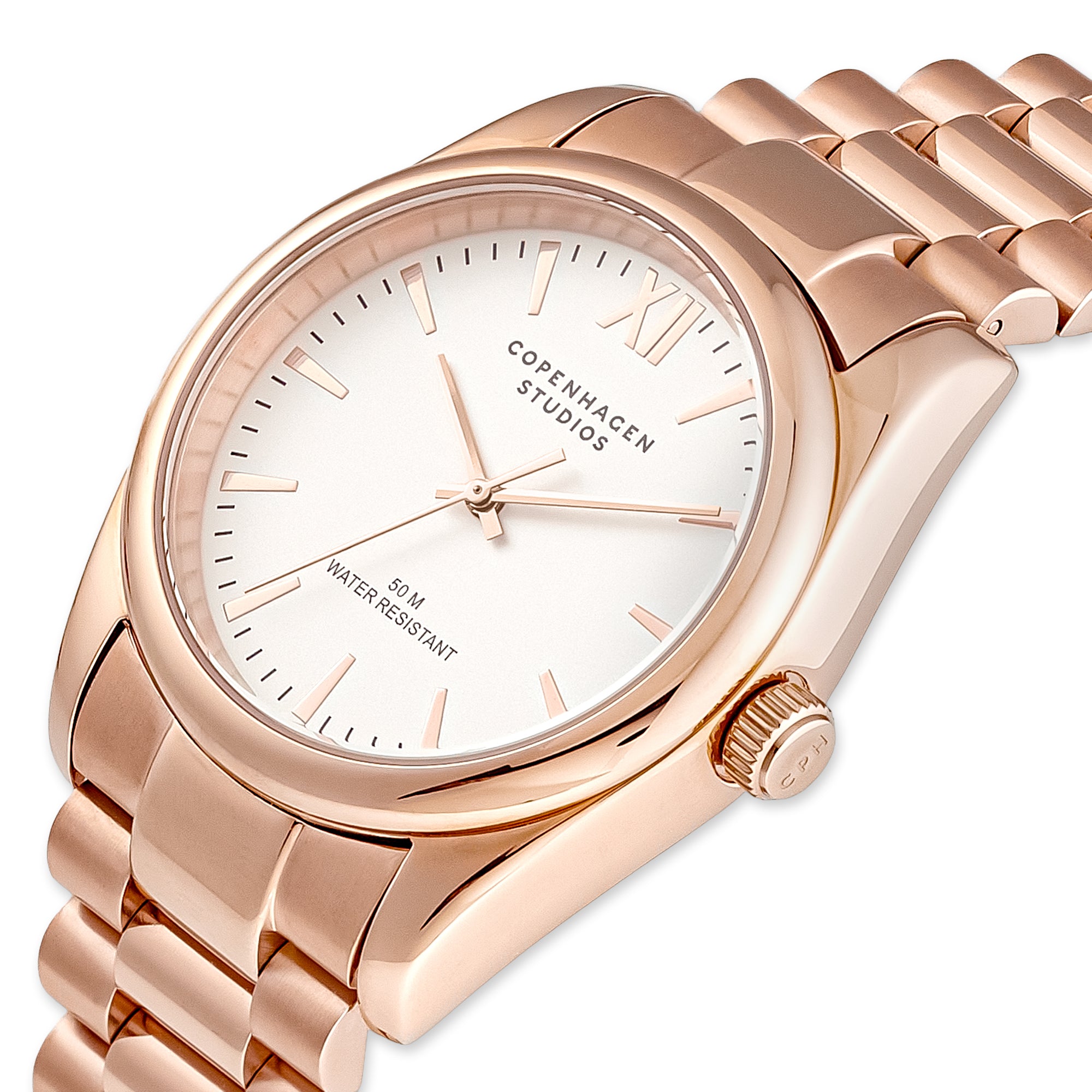 Die COPENHAGEN STUDIOS Armbanduhr - Round Watch von Copenhagen Studios besticht durch Roségoldtöne, ein weißes Zifferblatt mit minimalen Markierungen und ein Metallgliederband - ein elegantes Accessoire für jeden Anlass.
