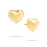 Echtzeit Ohrstecker - Puffy Heart: Diese glänzenden, goldenen Herz-Stecker von Echtzeit sind romantische Statement-Ohrringe und verkörpern zeitlose Eleganz.