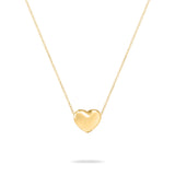 Zeitloses Accessoire: Die Echtzeit Halskette - Puffy Heart von Echtzeit aus Gold mit schlichtem Herzanhänger an feiner Kette, präsentiert auf weißem Hintergrund.