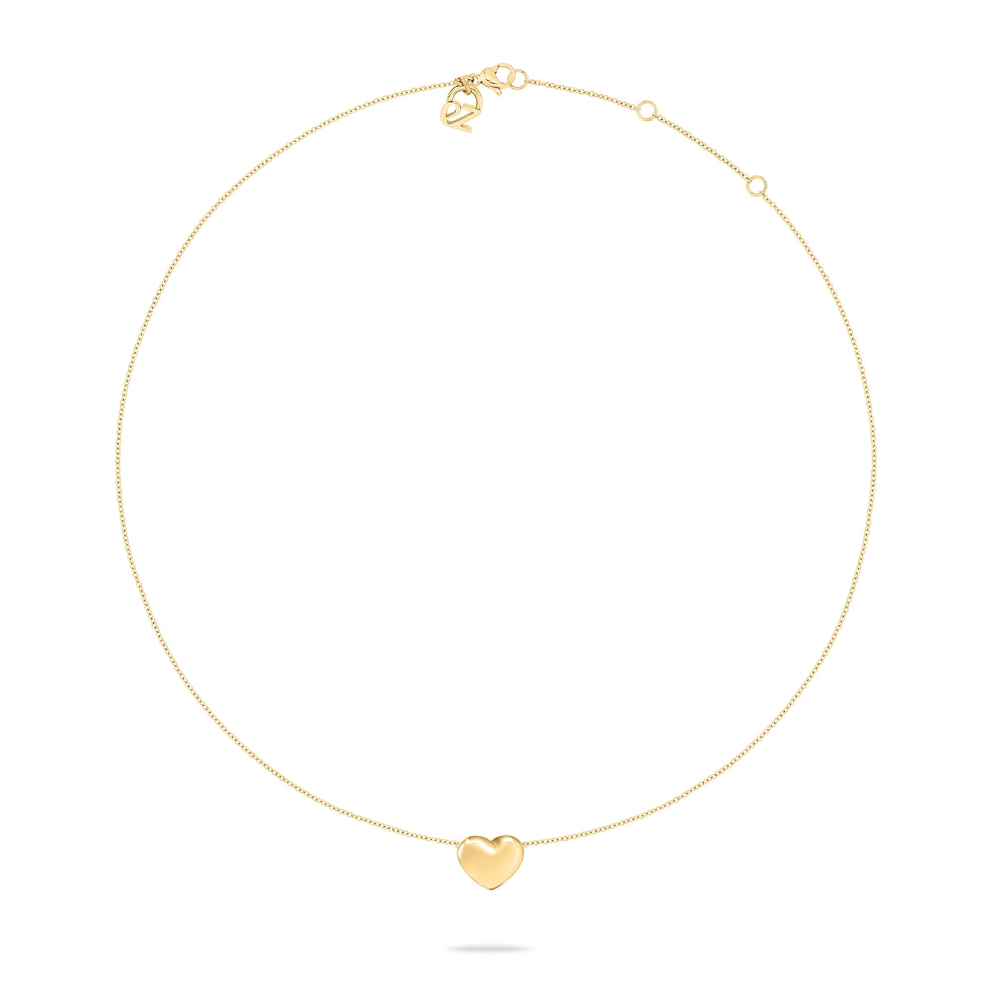 Die Echtzeit Halskette - Puffy Heart von Echtzeit hat eine zarte goldene Kette mit einem kleinen Herzanhänger auf feiner Kette, präsentiert vor weißem Hintergrund - ein elegantes Accessoire für jedes Outfit.
