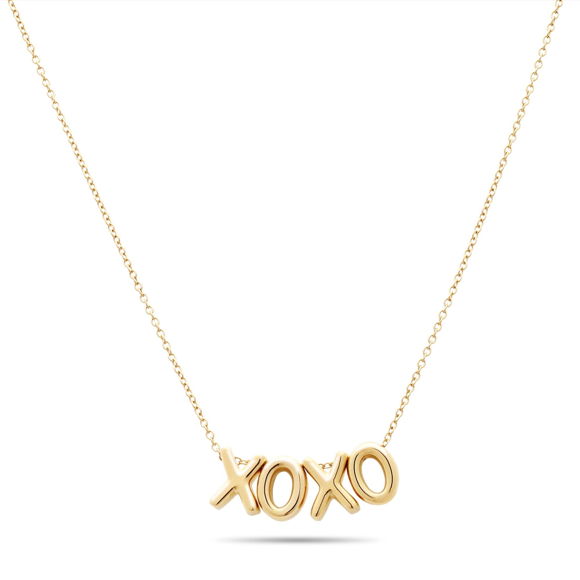 Die Echtzeit Halskette - XOXO von Echtzeit ist eine goldene Halskette mit einem XOXO-Anhänger an einer zarten Edelstahl Schmuck Kette. Dieses stilvolle Ketten Damen Stück ist auf einem weißen Hintergrund gezeigt, perfekt als Halskette XOXO.