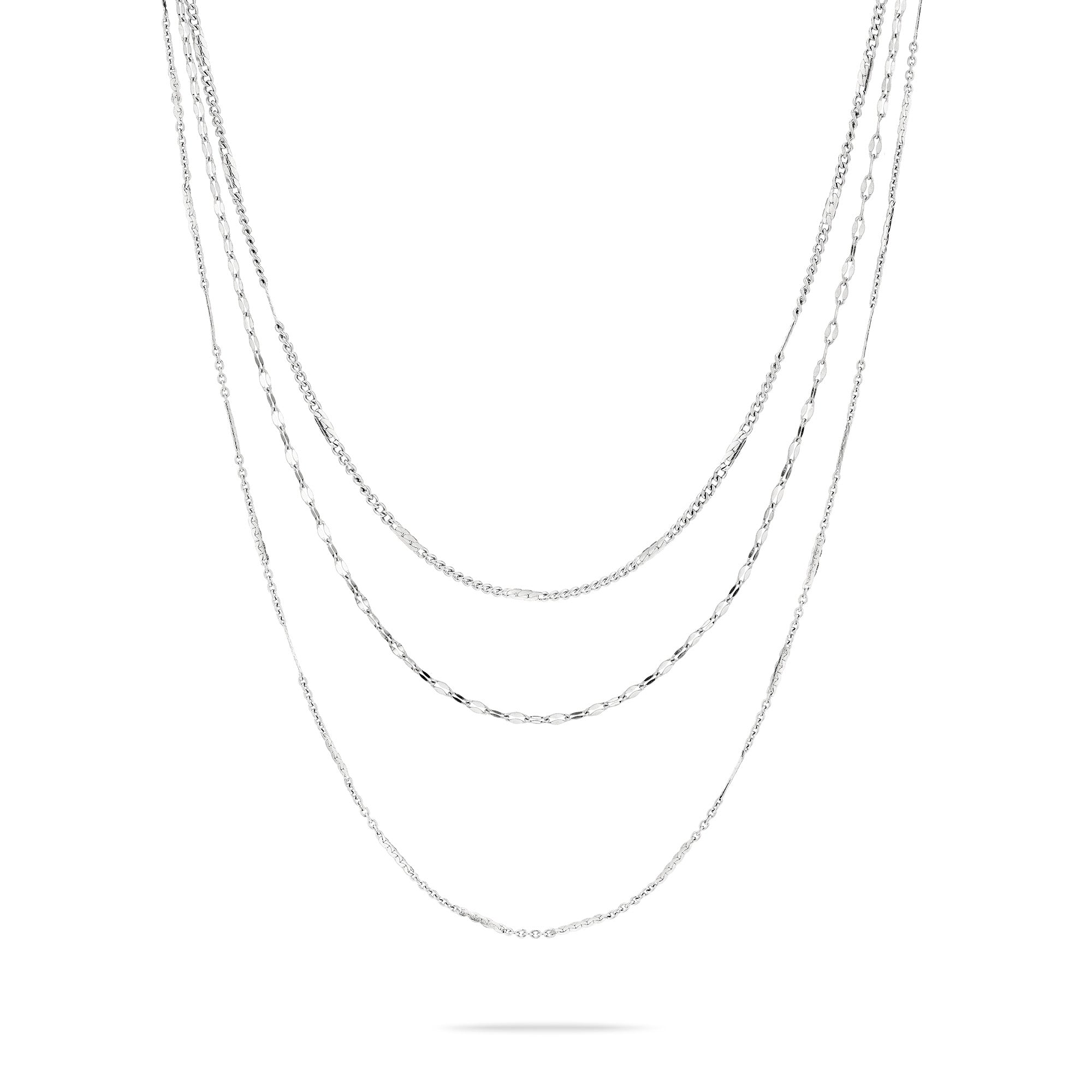 Die LIEBESKIND BERLIN Halskette - Sparkling With Layers von Liebeskind Berlin zeigt vier silberne Kettenlagen, die sich elegant in geschwungenen Linien vor einem schlichten weißen Hintergrund abzeichnen.