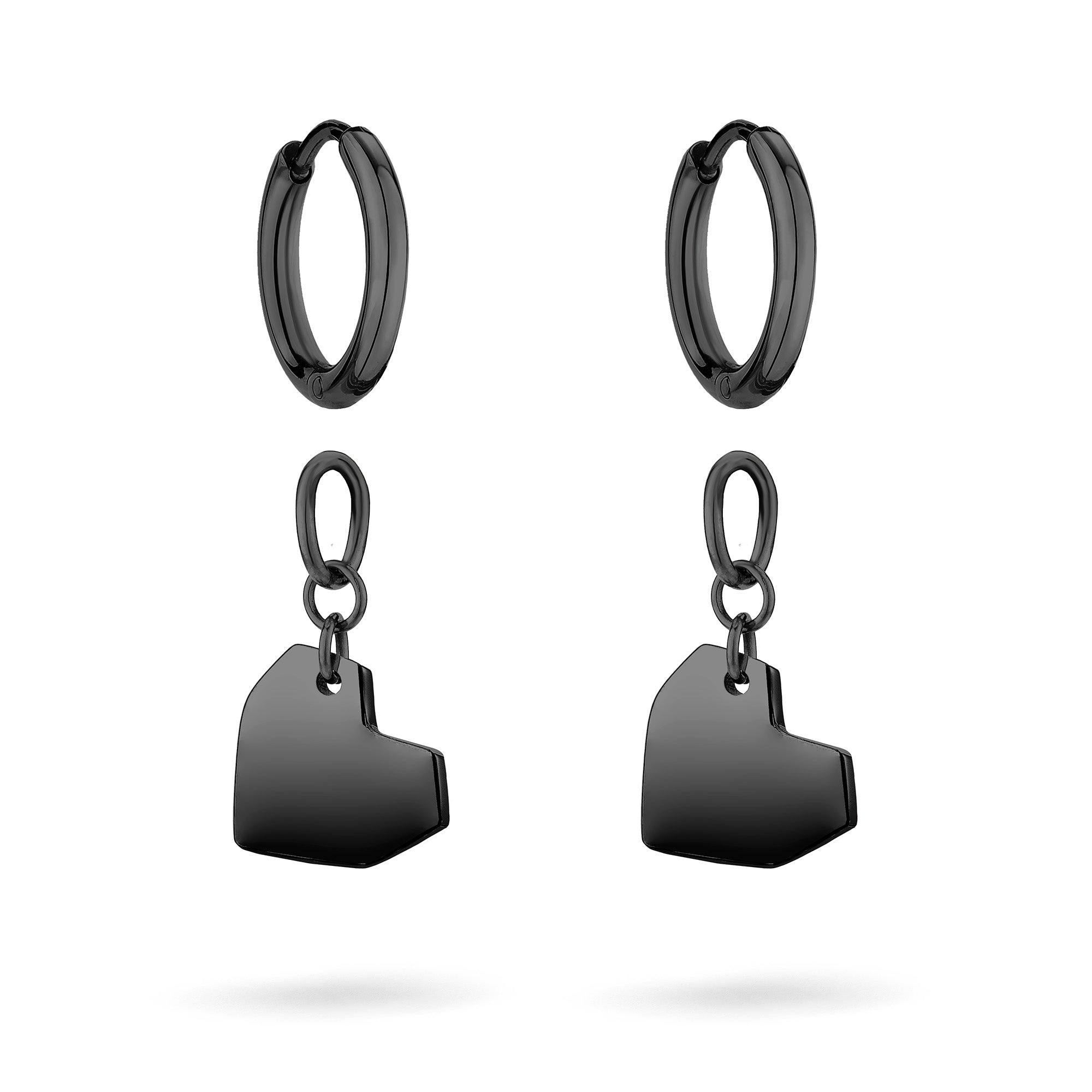 Die LIEBESKIND BERLIN Creole - Urban Heart, geometrische, schwarze Creolen von Liebeskind Berlin, sind mit asymmetrischen Herzanhängern versehen - ein auffälliges Accessoire auf weißem Hintergrund.