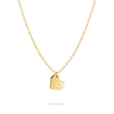 Die Liebeskind Berlin Halskette - Broken Heart, eine goldene Kette mit einem geometrischen herzförmigen Anhänger von Liebeskind Berlin, wird auf weißem Hintergrund präsentiert.