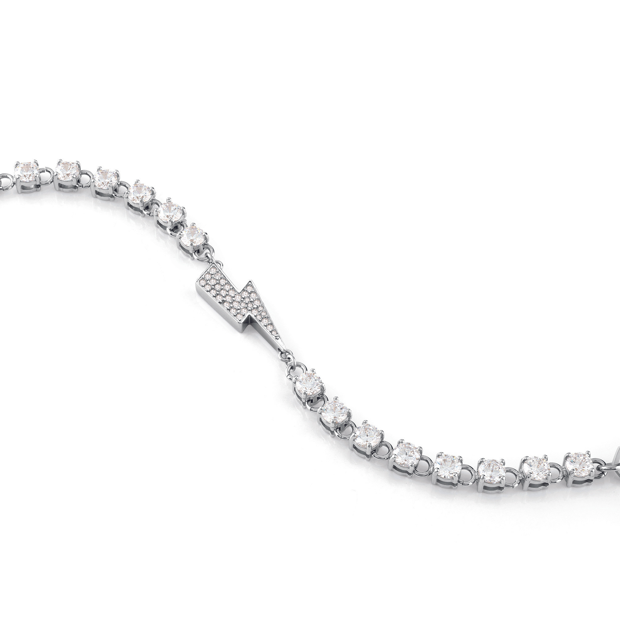 Das Philipp Plein Armband - PLEIN VANITY ist ein silbernes Tennisarmband mit runden Diamanten und einer blitzförmigen Mitte, inspiriert von der kühnen Eleganz der FW23-Kollektion von Philipp Plein.