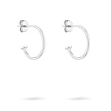Tamaris Creole - Der Schimmer: Kleine Ohrringe von Tamaris aus 925er Silber mit Ohrstecker, abgebildet auf weißem Hintergrund.