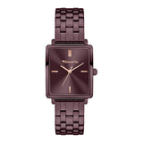Die Tamaris Armbanduhr - The Colorful Square verfügt über ein quadratisches Metallzifferblatt mit goldenen Indexen, ein bordeauxfarbenes Armband, ein praktisches Wechselarmband für einfache Stilwechsel und das Tamaris-Logo auf dem Zifferblatt.