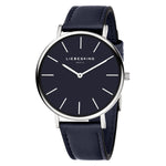 Die LIEBESKIND BERLIN Armbanduhr - Skandinavian Classic von Liebeskind Berlin hat ein schwarzes Zifferblatt, silberne Markierungen und ein marineblaues Lederarmband.
