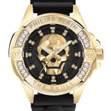 Philipp Plein Armbanduhr mit schwarzem Zifferblatt mit goldenem Totenkopfdesign und Glassteinindizes mit goldener Umrandung, goldenem Gehäuse, goldenem und glassteinverziertem Topring und schwarzem Silikonband; Produktbild