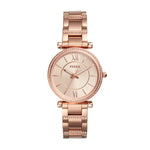 Die Fossil Carlie Classic Armbanduhr bietet ein roségoldenes Finish, funkelnde Lünette, römische Zahlen und Kristallakzente am Gehäuse und Armband-ideal für einen modischen Look.