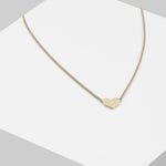 Liebeskind Berlin Set in der Farbe gold mit Kette mit grafischem Herzanhänger und Ohrstecker mit grafischem Herzmoitiv Produktbild