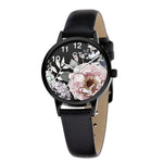 Cool Time Kids Armbanduhr mit Blütenmotiv auf dem Zifferblatt, schwarzem Gehäuse und schwarzem Kunstlederarmband; Produktbild