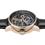 Die Ingersoll Armbanduhr - The Brown Jazz verfügt über ein skelettiertes Ziffernblatt, ein schwarzes Lederarmband und freiliegende Zahnräder in einem Roségoldgehäuse.
