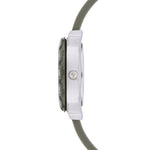 Cool Time Kids Armbanduhr mit Dino-Design auf dem Zifferblatt, grünem Gehäuse mit grünem, drehbarem Topring und grünem Kunstlederarmband mit Dino-Designs; Seitenansicht