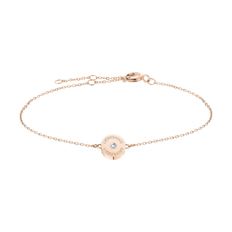 Liebeskind Berlin Armband bestehend aus einer filigranen, roségoldenen Kette mit einem Anhänger mit Logoaufdruck und einem zentrierten Zirkoniastein; Produktbild