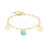 Tamaris Armband mit Gliederkette in der Farbe gold mit Logoanhänger, blauem Epoxidlack Anhänger und goldenem Anhänger Produktbild