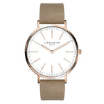 Liebeskind Berlin Armbanduhr mit Zirkoniadetails auf dem Zifferblatt, roségoldenen Indizes, roségoldenem Gehäuse und beigem Lederband; Produktbild