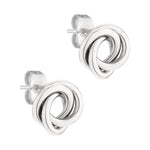 LIEBESKIND BERLIN Ohrstecker - Der große Knoten: Silberne Knoten-Ohrstecker mit ineinander verschlungenen Schlaufen im eleganten Edelstahl-Stil, hier auf Weiß. Ein modernes Accessoire von Liebeskind Berlin.