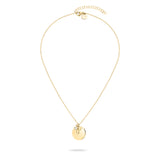 Tamaris Halskette - Flower by Tamaris: goldene Halskette mit rundem Plättchenanhänger und kleinem Charm an einer zarten Kette, auf weißem Hintergrund.