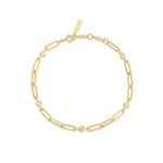 Das ANIA HAIE Armband - Paper Clip von Ania Haie besteht aus einer Goldkette mit länglichen Gliedern und fünf kleinen runden Diamanten auf weißem Hintergrund.