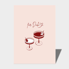 Eine rosafarbene Postkarte - Für Dich DIN A6 von Cool | Time mit zwei Cocktailgläsern mit Kirschen und einem Zettel darüber, auf dem "für Dich" mit einem Herz steht.