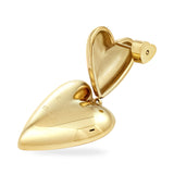 Der COPENHAGEN STUDIOS Ohrstecker - Puffy Hearts von Copenhagen Studios zeichnet sich durch ein goldenes herzförmiges, teilweise offenes Design mit einem kleineren Herz am Pfosten aus - ein elegantes und charmantes Accessoire.