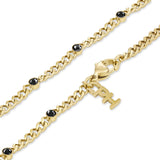 Das COPENHAGEN STUDIOS Armband - Glittery von Copenhagen Studios ist ein goldenes Kettenarmband, das mit schwarzen Edelsteinen und einem baumelnden "PH"-Anhänger verziert ist und mit der für die Marke typischen Eleganz gestaltet wurde.