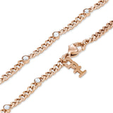 Roségoldene Halskette mit klaren Schmucksteinen und hängenden QPH-Anhängern, elegant kombiniert mit dem Copenhagen Studios Armband - Glittery für einen raffinierten Look.