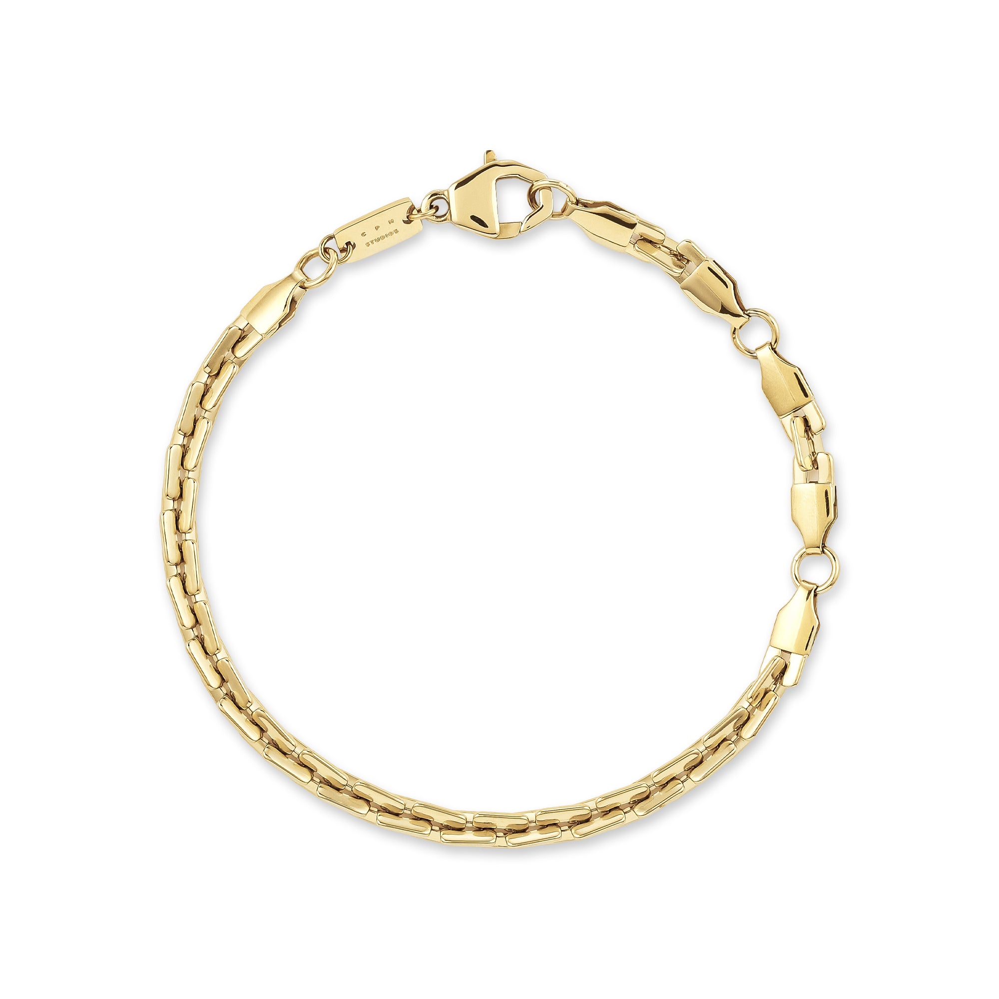 Das COPENHAGEN STUDIOS Armband - Edgy Bracelet ist mit rechteckigen Goldgliedern und einem Karabinerverschluss ausgestattet und zeigt das moderne Design der Copenhagen Studios für einen mutigen, zeitgenössischen Stil. Auf weißem Hintergrund abgebildet.