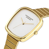 Die COPENHAGEN STUDIOS Armbanduhr - Curved Watch von Copenhagen Studios zeichnet sich durch ein goldenes Gehäuse, ein weißes Zifferblatt und ein minimalistisches Design aus - ideal für alle, die eine kurvige Uhrenästhetik lieben.