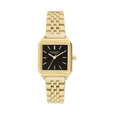 Die COPENHAGEN STUDIOS Armbanduhr - Vintage Watch von Copenhagen Studios hat ein rechteckiges schwarzes Zifferblatt, goldene Indexe und ein goldenes Gliederarmband, das an das klassische quadratische Uhrendesign erinnert.