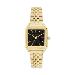 Die COPENHAGEN STUDIOS Armbanduhr - Vintage Watch von Copenhagen Studios hat ein rechteckiges schwarzes Zifferblatt, goldene Indexe und ein goldenes Gliederarmband, das an das klassische quadratische Uhrendesign erinnert.