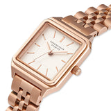 Die COPENHAGEN STUDIOS Armbanduhr - Vintage Watch hat ein roségoldenes Metallgliederband und ein minimalistisches weißes Zifferblatt mit dem eleganten Branding der Copenhagen Studios.