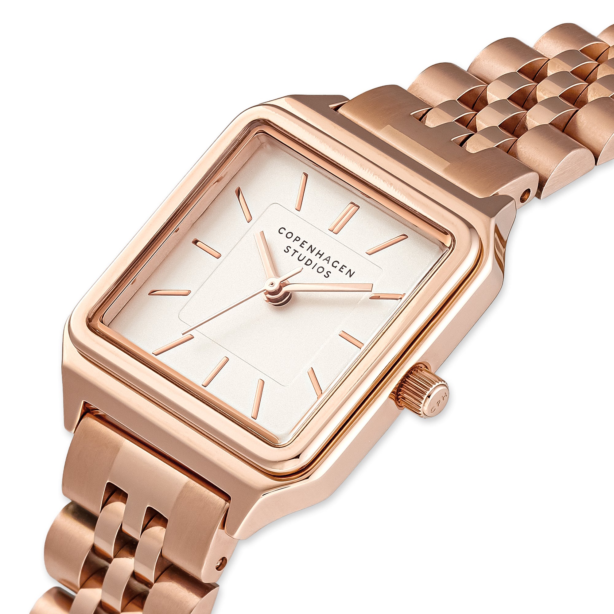 Die COPENHAGEN STUDIOS Armbanduhr - Vintage Watch hat ein roségoldenes Metallgliederband und ein minimalistisches weißes Zifferblatt mit dem eleganten Branding der Copenhagen Studios.