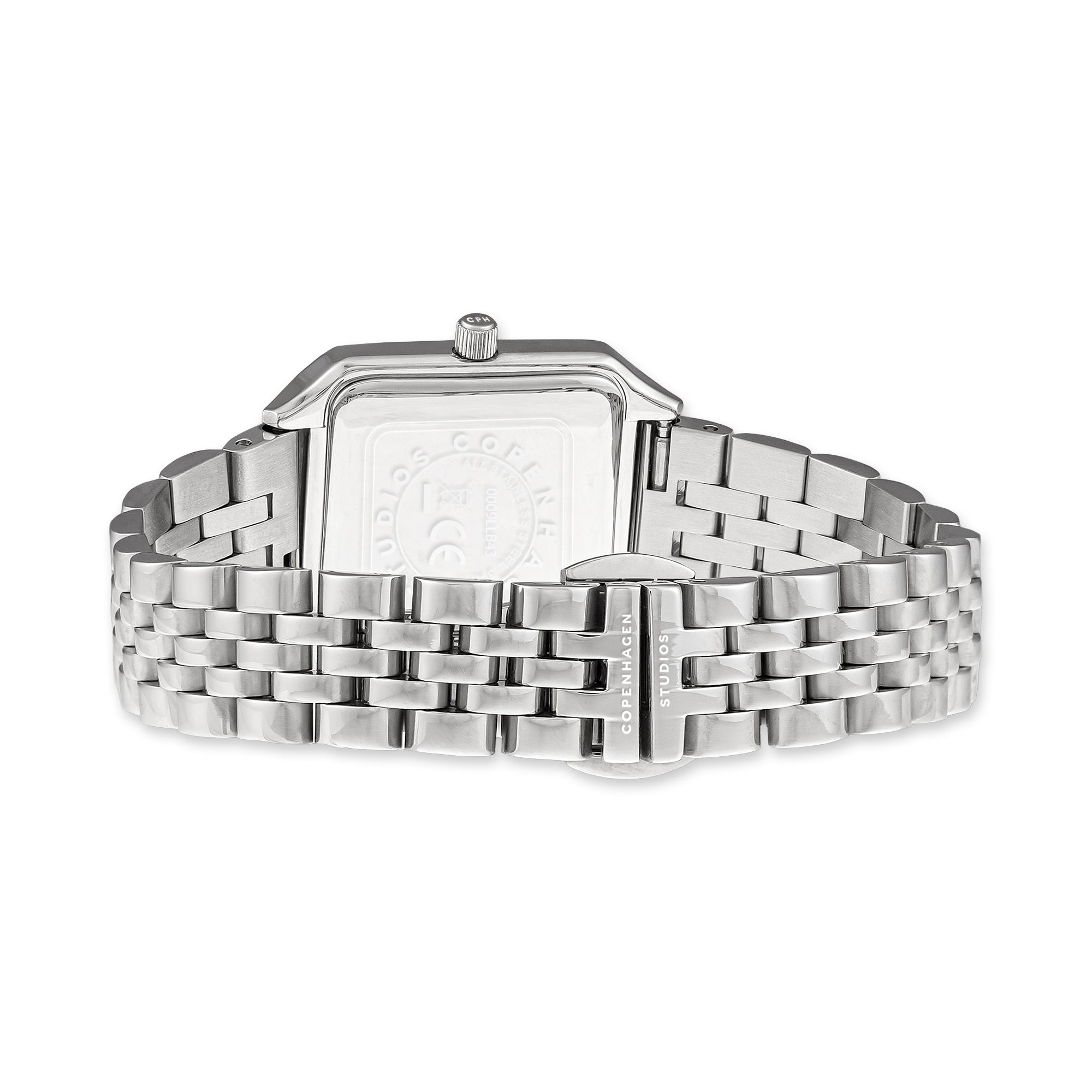 Die COPENHAGEN STUDIOS Armbanduhr - Vintage Watch von Copenhagen Studios hat ein rechteckiges Zifferblatt, ein Metallgliederband und eine Markenschließe, die den klassischen Vintage-Stil widerspiegelt. Hier von hinten abgebildet.