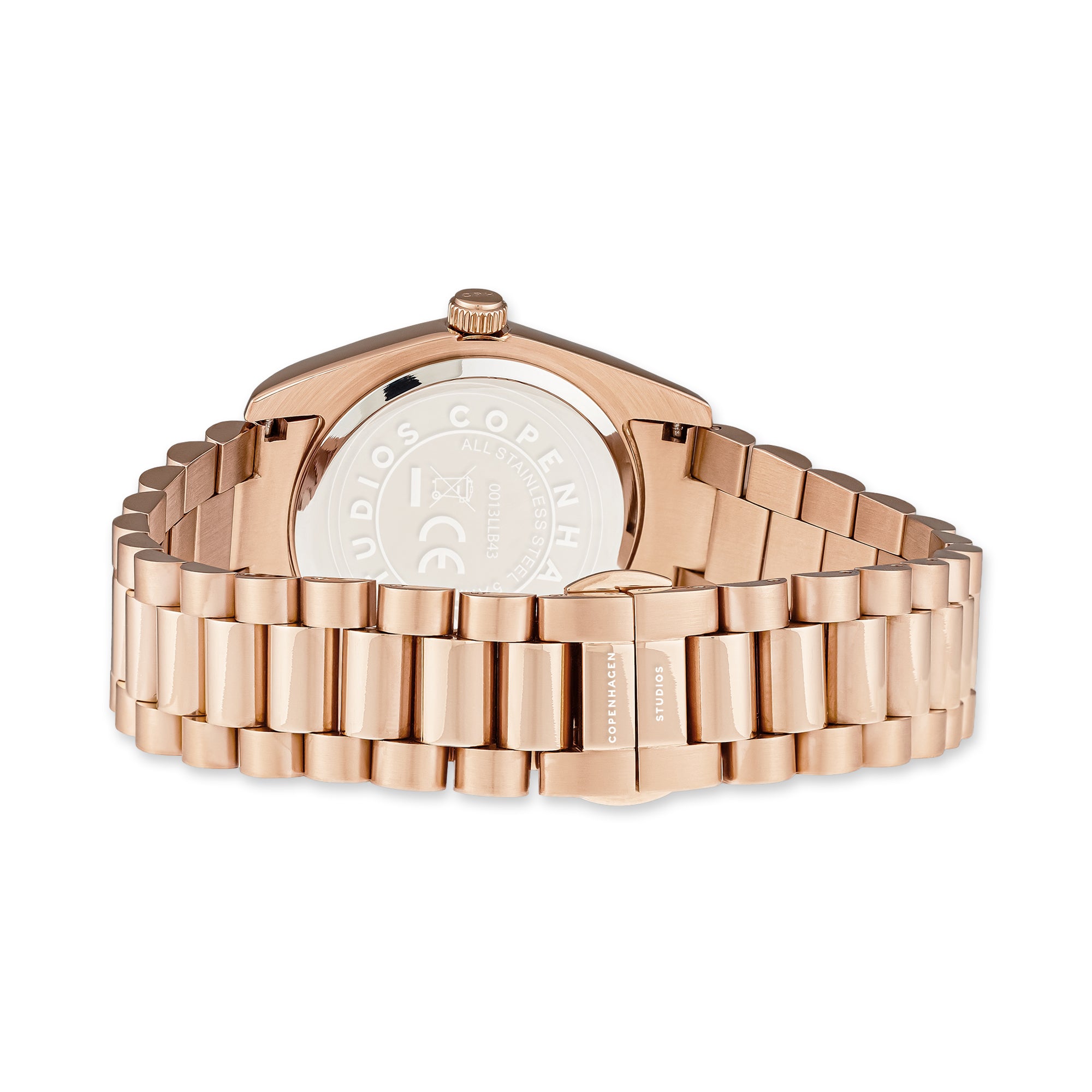 Die COPENHAGEN STUDIOS Armbanduhr - Round Watch von Copenhagen Studios wird von hinten gezeigt, wobei das Metallband und der gravierte Gehäuseboden hervorgehoben werden - ein elegantes Accessoire für jeden Anlass.