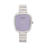 Die COPENHAGEN STUDIOS Armbanduhr - Curved Watch von Copenhagen Studios hat ein minimalistisches Design, ein silbernes Band und ein lavendelfarbenes Zifferblatt mit dem Namen der Marke auf dem Zifferblatt.