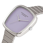 COPENHAGEN STUDIOS Armbanduhr - Curved Watch von Copenhagen Studios: Eine silberne Damenuhr mit lavendelfarbenem Zifferblatt und minimalistischem Design, ideal für einen zeitgenössischen Stil.