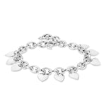 Das Echtzeit Armband - Endless Love von Echtzeit zeigt zarte Herzanhänger in gleichmäßigen Abständen entlang einer silbernen Gliederkette, die sich wunderschön vor einem weißen Hintergrund präsentiert.